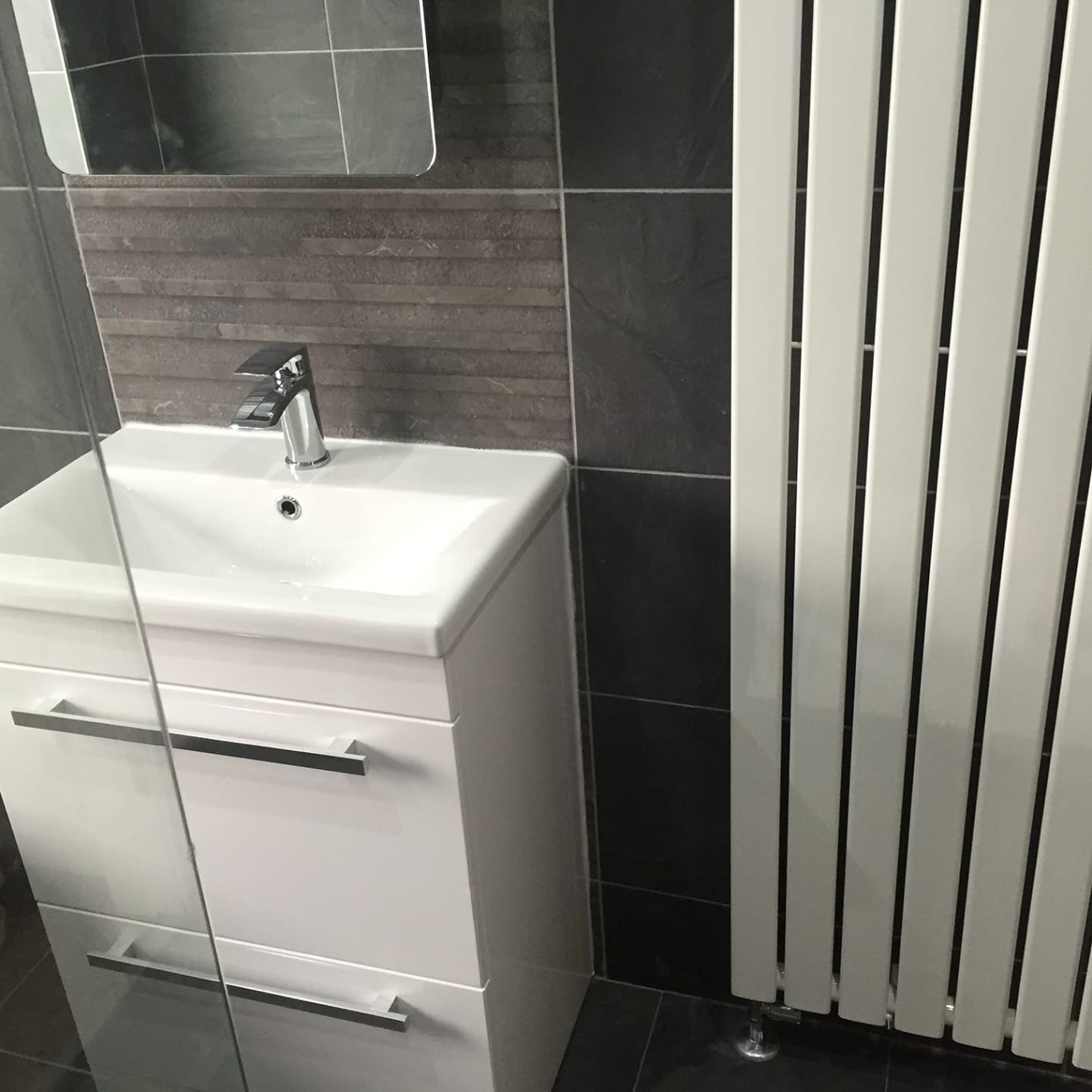 bathroom sink and pedestal